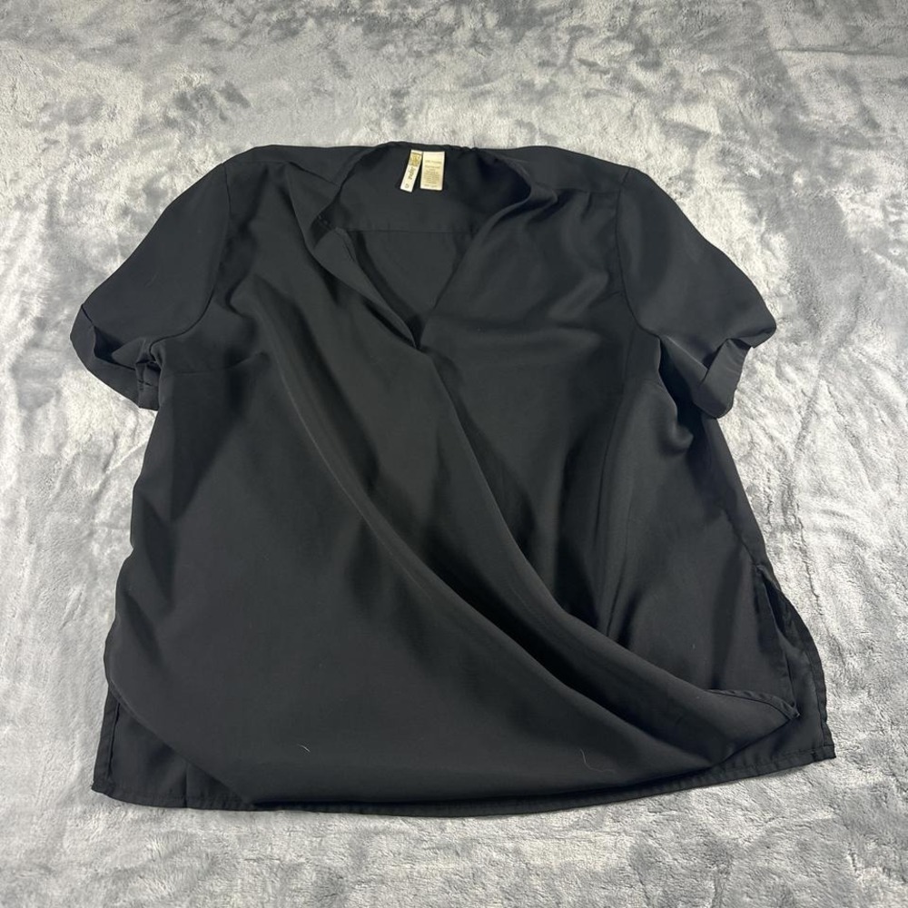 Black blouse with a twist detail